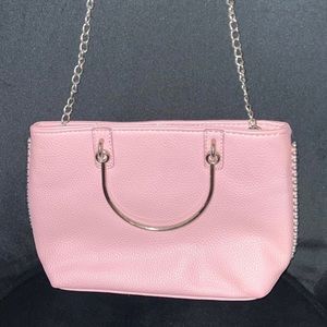 Pink leather handbag